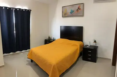 Una televisión o centro de entretenimiento en Departamento en Mazatlan 5 min del Malecón