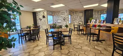 Un restaurante o sitio para comer en Condomino Maripina