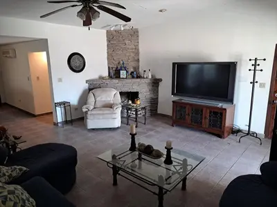 Una televisión o centro de entretenimiento en Casa en Huepac