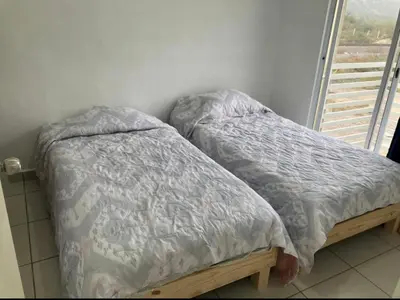 Cama o camas de una habitación en Departamento en segundo piso