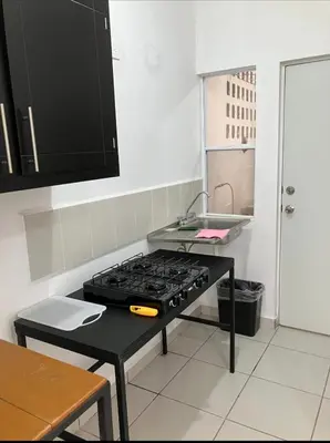 Una cocina o zona de cocina en Departamento en segundo piso