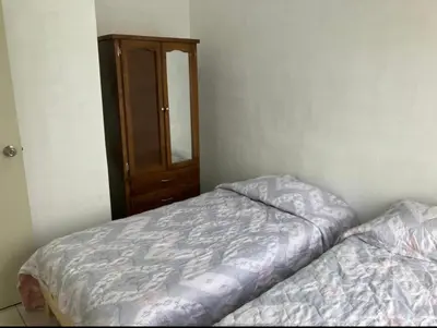 Cama o camas de una habitación en Departamento en segundo piso
