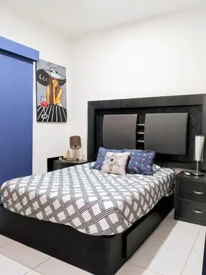 Cama o camas de una habitación en Departamento colon