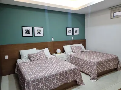 Cama o camas de una habitación en Sunset en Malecon de Mazatlan!