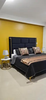 Cama o camas de una habitación en Torre 5 Mazatlán Versace Style