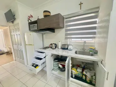 Una cocina o zona de cocina en Costa Bonita Mazatlán Departamento pie de playa Beach Resort