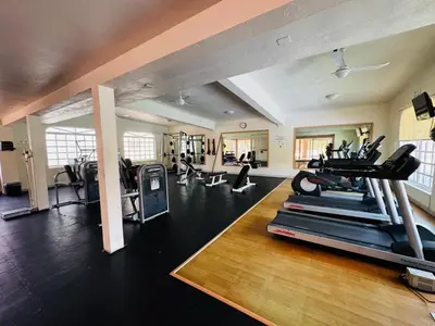 Gimnasio o instalaciones de fitness de Costa Bonita Mazatlán Departamento pie de playa Beach Resort