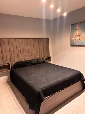 Cama o camas de una habitación en Estancias Nava #1