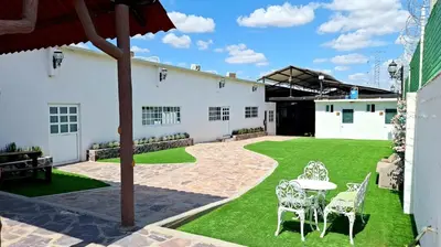 Jardín al aire libre en Hotel La Leyenda Sonora