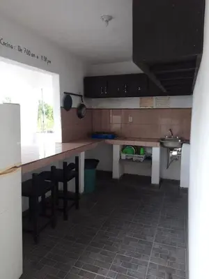 Una cocina o zona de cocina en La Terraza-Habitación 1