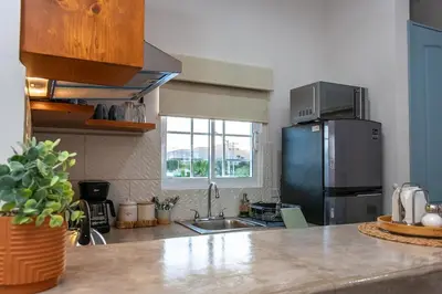 Una cocina o zona de cocina en Casa Bonita - Depa compacto 2 Habitaciones