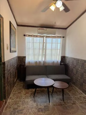 Zona de estar de Departamento Amueblado Jazmin