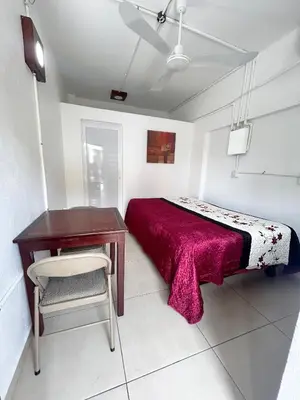 Cama o camas de una habitación en Habitaciones del centro