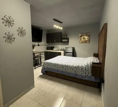 Cama o camas de una habitación en Estancias Nava #3