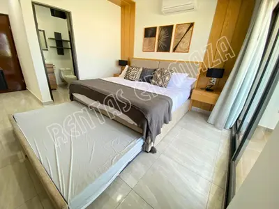 Cama o camas de una habitación en Condominios Marina Cerritos 1