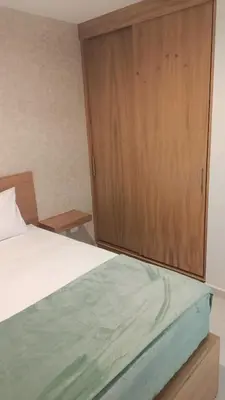 Cama o camas de una habitación en Oceanna Condos de Mar apartamento frente al mar