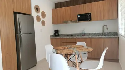 Una cocina o zona de cocina en Oceanna Condos de Mar apartamento frente al mar