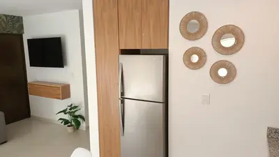 Una cocina o zona de cocina en Oceanna Condos de Mar apartamento frente al mar