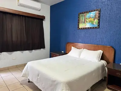 Cama o camas de una habitación en Rio inn