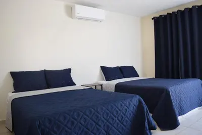 Cama o camas de una habitación en Hotel Esperanza