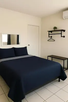 Cama o camas de una habitación en Hotel Esperanza