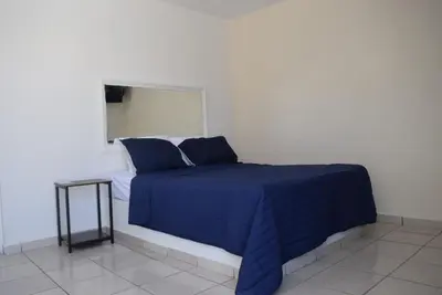 Cama o camas de una habitación en Hotel Esperanza