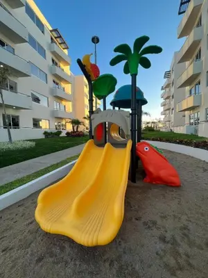 Zona de juegos infantil en Mazablue depa en laguna con playas artificiales