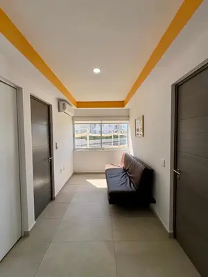 Zona de estar de Fantástico Depa en BLUU con PLAYA ARTIFICIAL - Turquesa 208 -