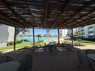Piscina en o cerca de Fantástico Depa en BLUU con PLAYA ARTIFICIAL - Turquesa 208 -