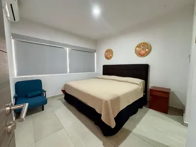 Cama o camas de una habitación en Fantástico Depa en BLUU con PLAYA ARTIFICIAL - Turquesa 208 -