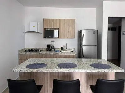 Una cocina o zona de cocina en Bluü Habitat with Beach and Premium Amenities
