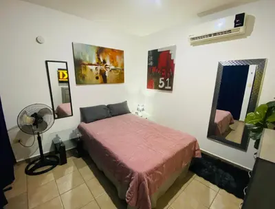 Cama o camas de una habitación en Departamento en zona turística
