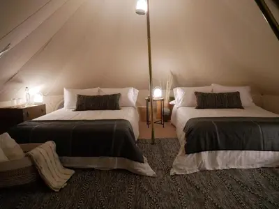 Cama o camas de una habitación en Endemica Glamp Resort