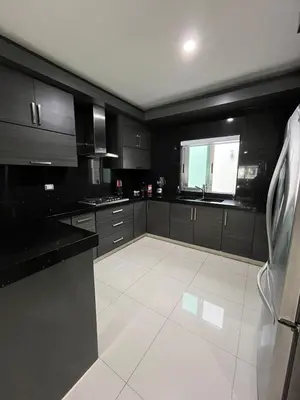 Una cocina o zona de cocina en QA Departamento de lujo en primer piso en Quintas