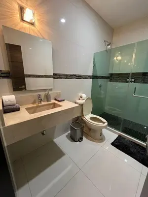 Un baño de QA Departamento de lujo en primer piso en Quintas