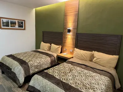 Cama o camas de una habitación en Hotel Los Valles Plus
