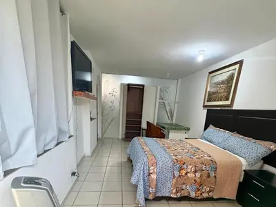 Cama o camas de una habitación en Departamento Suite familiar frente a las riberas