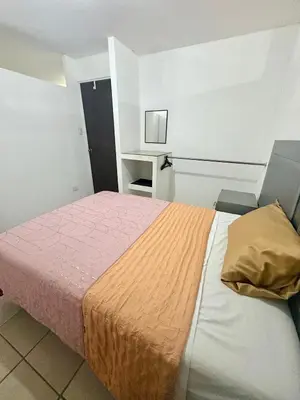 Cama o camas de una habitación en Departamento Suite familiar frente a las riberas