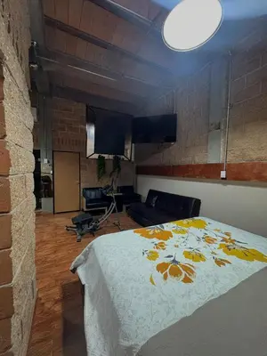 Cama o camas de una habitación en LOFT NUEVO EN MALECON FTE AL Parque las Riveras