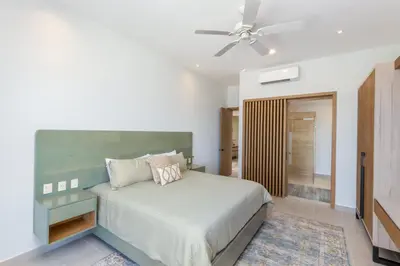 Cama o camas de una habitación en Danzante Bay Oceanfront 2 BR Beach & Golf