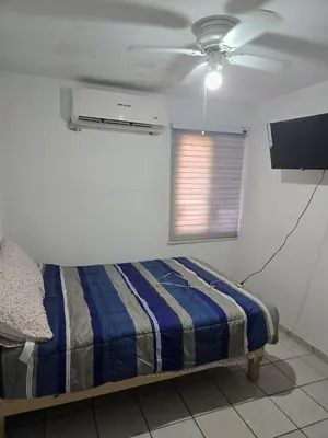 Cama o camas de una habitación en Alojamiento entero