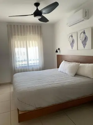 Cama o camas de una habitación en CASA DE PLAYA