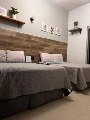 Cama o camas de una habitación en Eco-Hotel