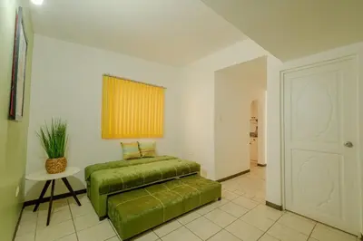 Cama o camas de una habitación en Casa Aby céntrica y familiar