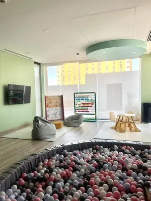 Una televisión o centro de entretenimiento en Departamento Edificio Imperia