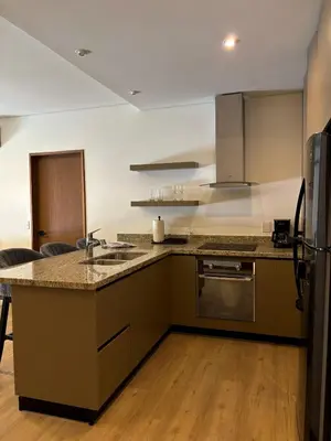 Una cocina o zona de cocina en Departamento Edificio Imperia
