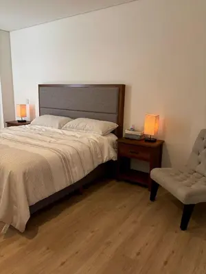Cama o camas de una habitación en Departamento Edificio Imperia