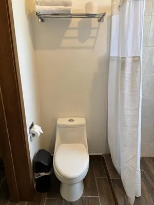 Un baño de Departamentos Aremay