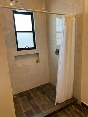 Un baño de Departamentos Aremay