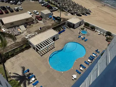 Piscina en o cerca de Quiet apartment with pool right on the beach